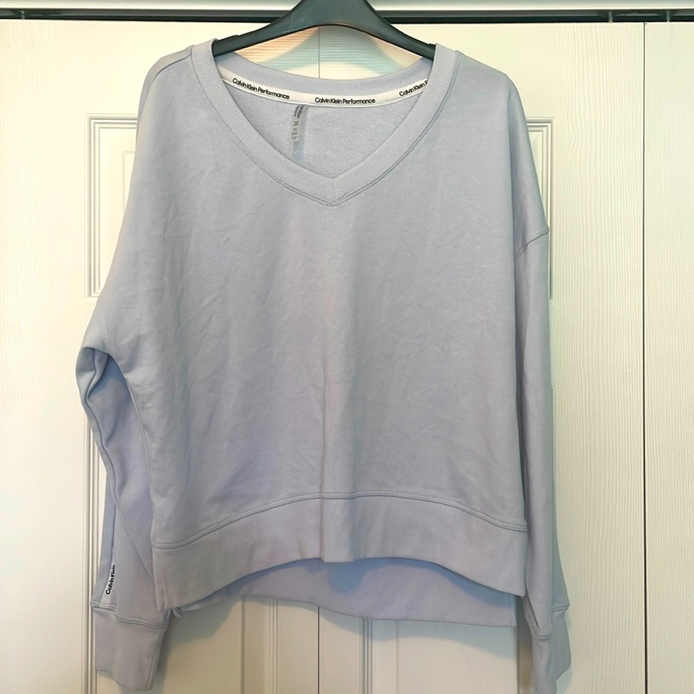 NWT Calvin Klein performance sweatshirt. Size large color light blue.